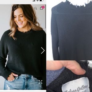 Chelsea DeBoer distressed sweater
